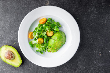 avocado salad green leaves fresh healthy meal food snack on the table copy space food background rustic top view keto or paleo diet veggie vegan or vegetarian food no meat