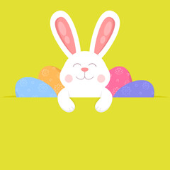 Cute Easter bunny with colorful eggs
