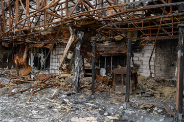 Fototapeta na wymiar Fire in cafe kitchen, damage to civilian infrastructure. Shopping center in Kherson, Ukraine shelled in destroyed by Russian troops, occupation, war. 