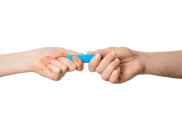 Rechargeable battery offer from a male hand to a female, isolate on a white background.