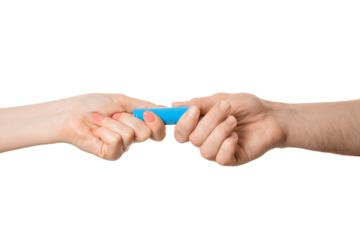 Rechargeable battery offer from a male hand to a female, isolate on a white background.