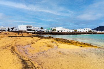 Beach and white architecture in Caleta del Sebo, La Graciosa, Canary Islands, Spain