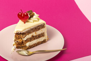 Background of carrot cake with heart candle for Valentine's Day