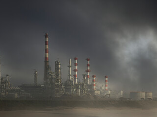 Obraz na płótnie Canvas Oil refinery chimneys and towers