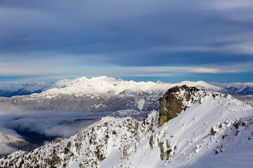 Canadian Mountain Landscape Nature Background covered in snow. Blackcomb Mountain in Whistler, British Columbia, Canada.