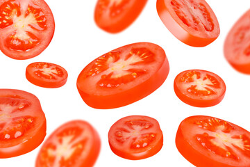Flying tomatoes cut into circles. Tomatoes, tomatoes, cut, fresh tomatoes. Isolated.Background from...