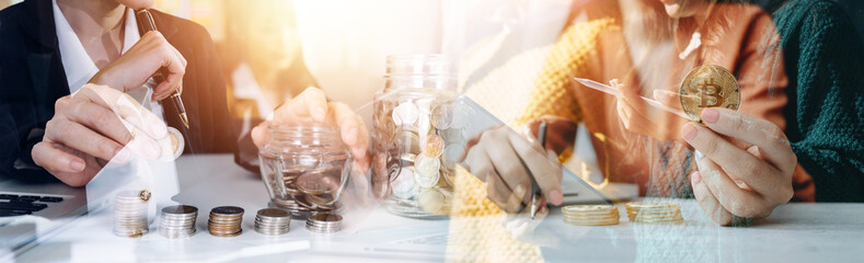 Businessman and team analyzing financial statement Finance task. with smart phone and laptop and...