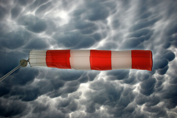 Wind meter flag waving in cloudy weather