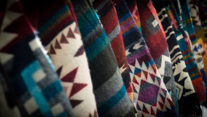 Close-Up of assorted Native American Textiles hanging side by side