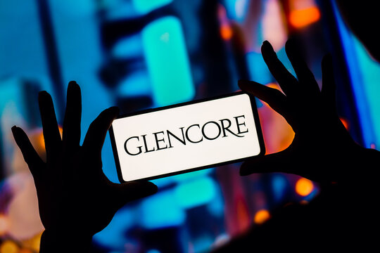 January 11, 2023, Brazil. In this photo illustration, the Glencore Xstrata plc logo is displayed on a smartphone screen.