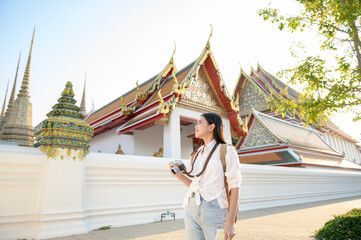 Beautiful tourist woman on vacation sightseeing and exploring Bangkok city, Thailand, Holidays and traveling concept