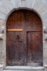 Fototapeta na wymiar Segovia, España. April 28, 2022: Doors of houses in the city. Wooden doors.