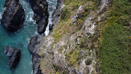 Seashore, view perpendicular from above. Beautiful sea rocks. The edge of the Atlantic Ocean. A natural attraction. Drone point of view.