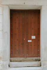 Obraz na płótnie Canvas Segovia, España. April 28, 2022: Doors of houses in the city. Wooden doors.