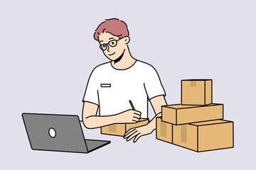 Young man in glasses look at laptop sign parcels at post. Smiling male worker write address and receiver on package in postal office. Vector illustration.  - obrazy, fototapety, plakaty