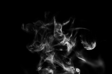 White steam smoke on solid black background with abstract blur motion wave swirl use as an overlay...