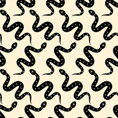 Vector seamless patterns with black snakes. Repeated glyph snakes on yellow backdrop