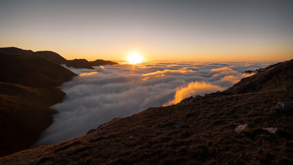 Above the clouds  in the top of mountain, with a sea of clouds below us