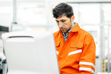 Team of engineers practicing maintenance Taking care and practicing maintenance of machines in the factory so that they can be used continuously.