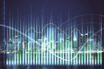 Financial graph on night city scape with tall buildings background multi exposure. Analysis concept.
