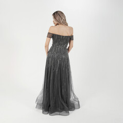 a model in an elegant evening dress dress