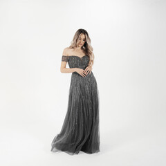 a model in an elegant evening dress dress