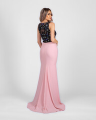 a model in an elegant evening dress dress