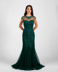a model in an elegant evening dress dress
