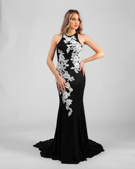 a model in an elegant evening dress dress