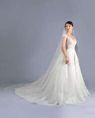 Fototapeta na wymiar Elegant bride in a wedding dress