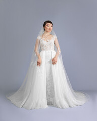 Fototapeta na wymiar Elegant bride in a wedding dress