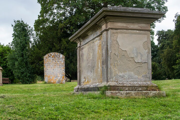Fototapeta premium Old English tomb grave stone in a church graveyard