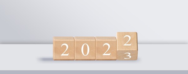 2023 concept. Wooden blocks or cubes on desk
