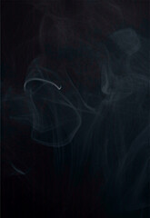 white smoke on a black background.