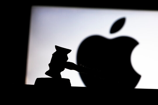 Apple Nasdaq company and judge gavel silhouette, corruption and bribery concept, law decision concept