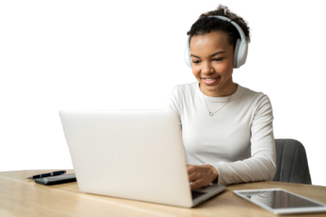 A female student with headphones is typing a message on a laptop on a transparent background.
