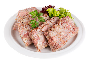 Canned buckwheat porridge with meat served on a plate with tomato and herbs