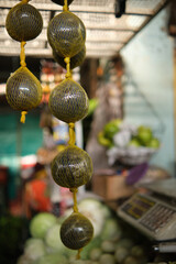 borojo packaged and hung at farmers' market for sale