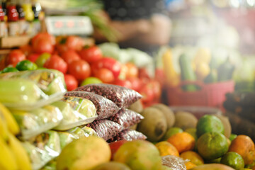 Beans packed in plastic bags for sale in the fruit and vegetable market, selective focus