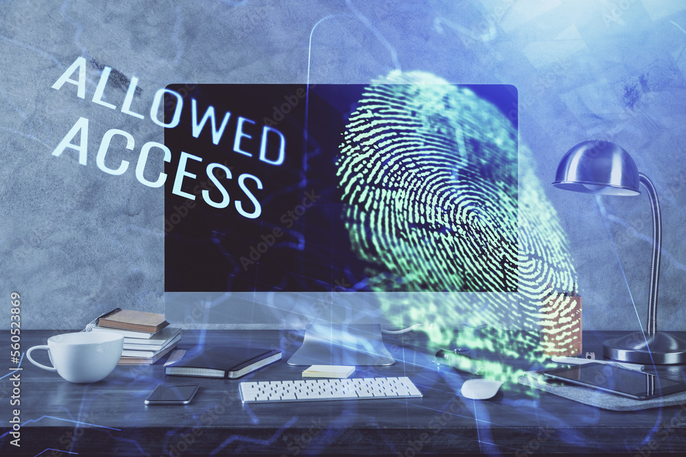 Poster Computer on desktop in office with finger print drawing. Double exposure. Concept of business data security.