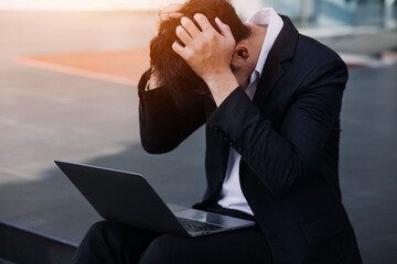 Depressed businessman lost his business. Destroyed businessman. Concept of business loss,...