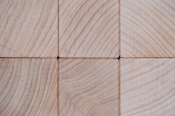 Background, wooden beech texture of end of square cubes.