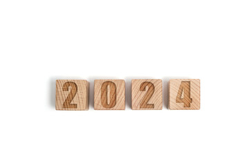 Wooden cubes with numbers 2024, white background.