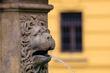 Ancient fountains with sculptures in the architecture of the city. Historical and cultural heritage...