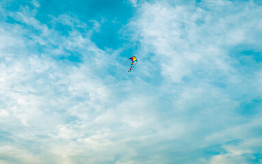 Fototapeta na wymiar Colorful kite in the sky.