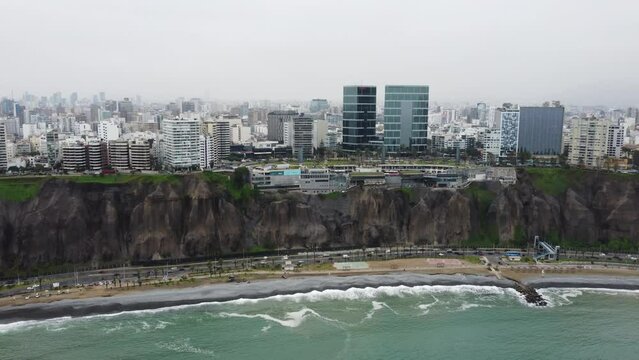 Beach, waves, the promenade of the Miraflores district. Lima, Peru