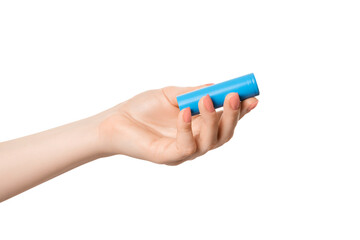 Rechargeable 18650 or 21700 battery in a female hand, isolate.