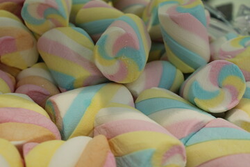 background food colored marshmallow marshmallows close-up. A day without sweetness without diet