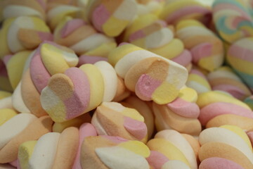 background food colored marshmallow marshmallows close-up. A day without sweetness without diet