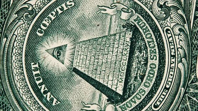 The all-seeing eye sign rotates on a one dollar bill close-up. Mason sign symbol. Concept inflation, economy, conspiracy. US banknote in macro with pyramid and mason eye. New world order, elite. 4K